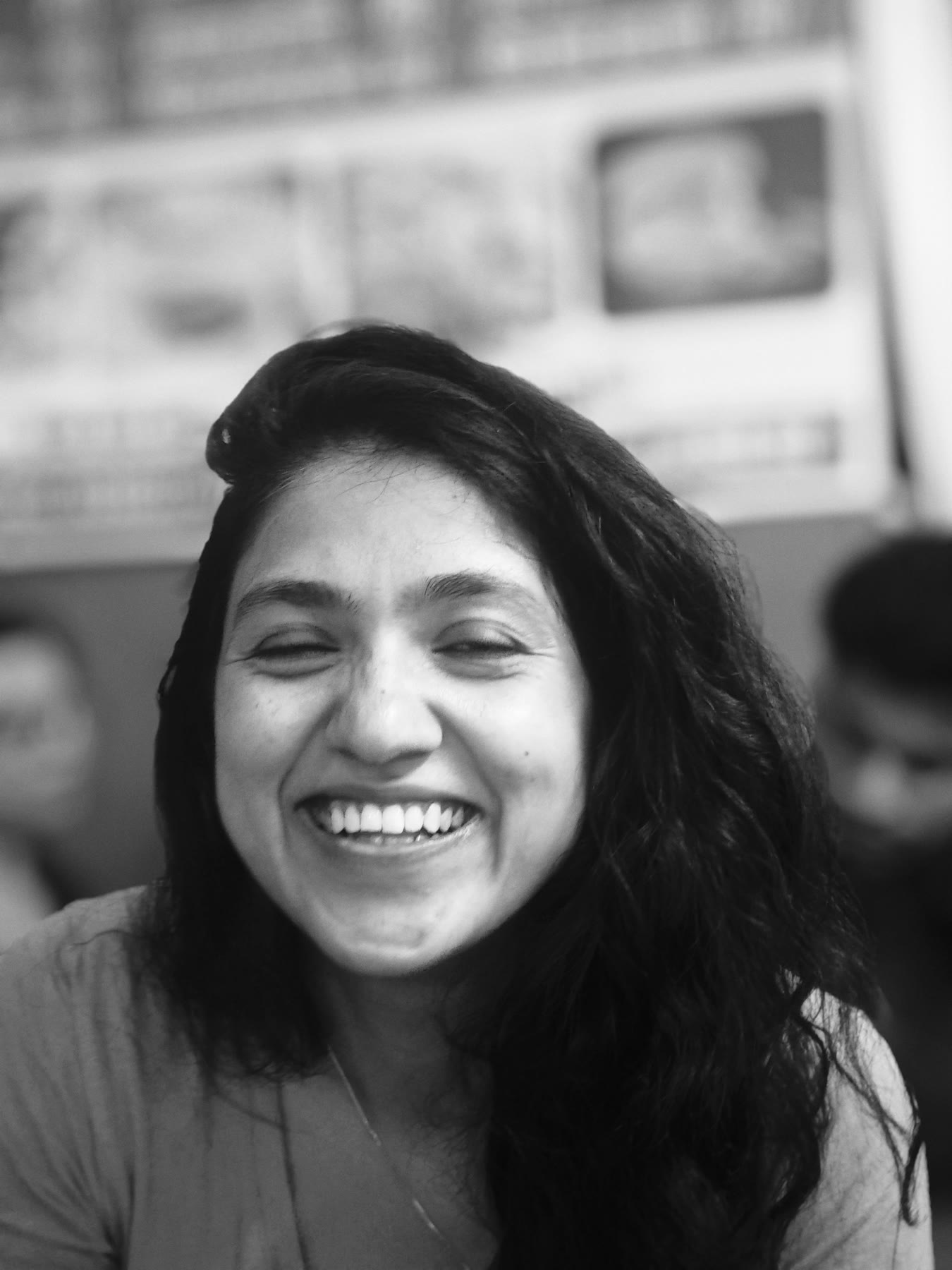 Black-and-white close portrait of Sarika smiling