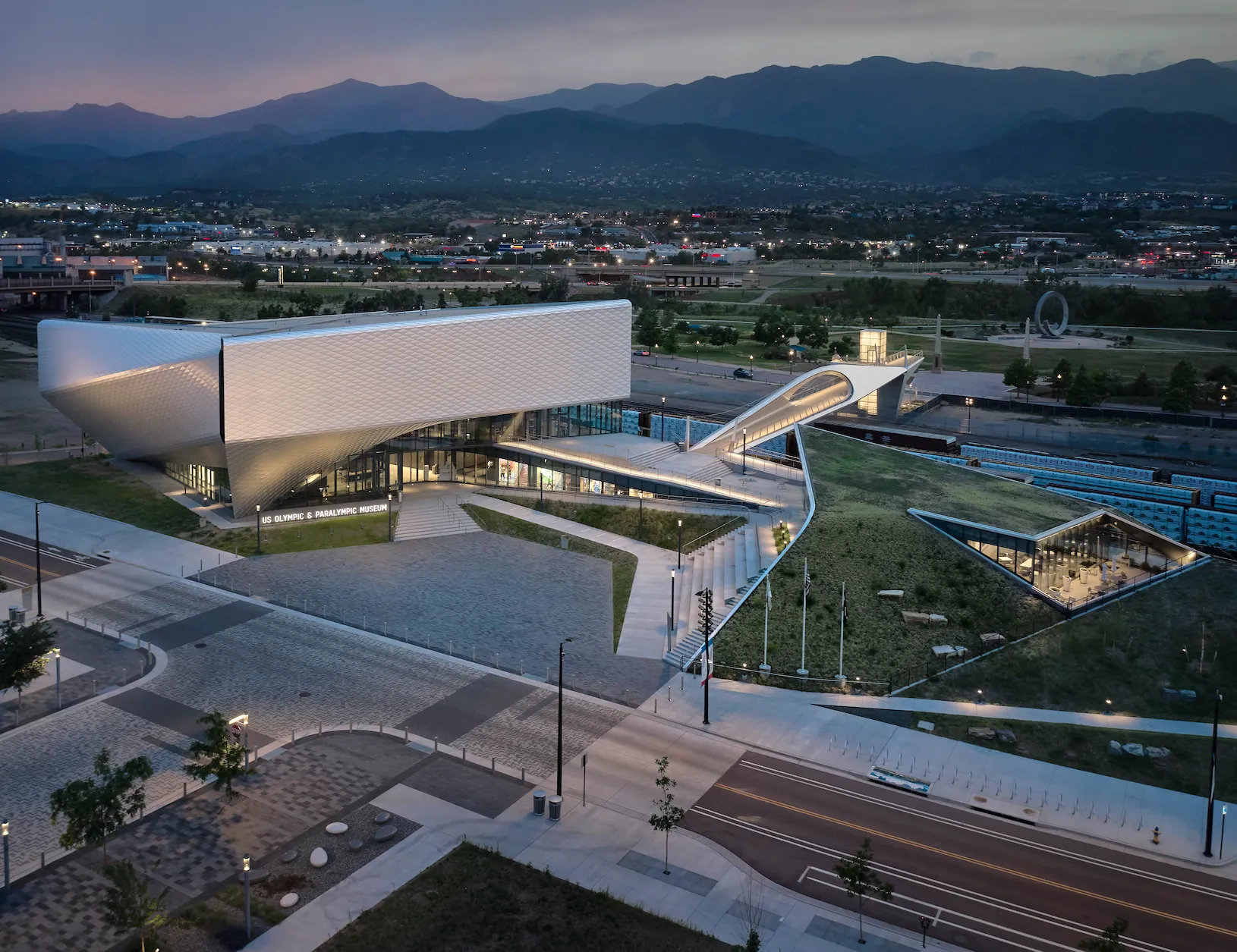 Museum campus and connecting park bridge showing facade illlumination and pedestrian lighting