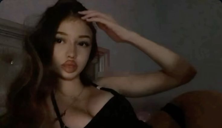 kids lying on a glass land and smiling