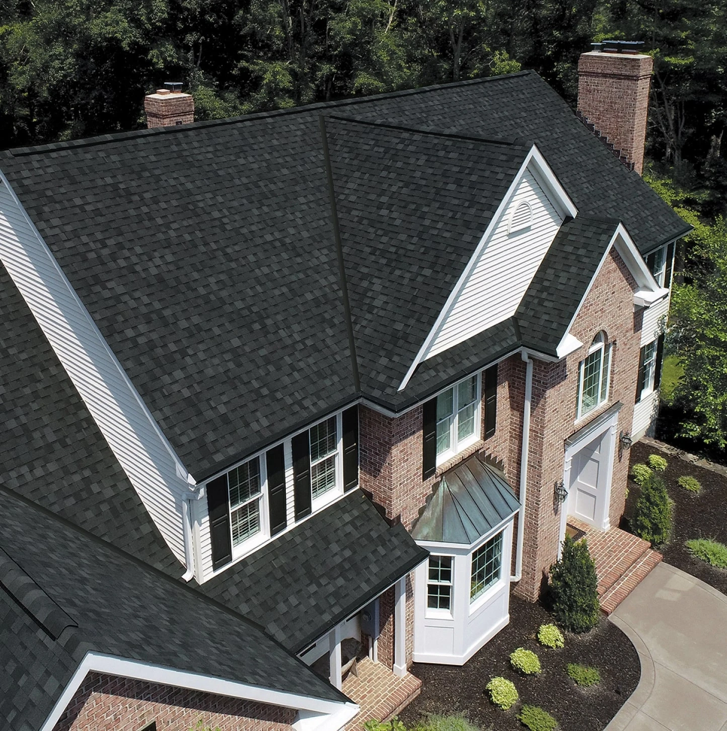 IKO manufacturer photograph of Nordic shingles in Granite Black.