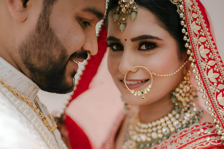 The bride and groom sharing a quiet moment face to face