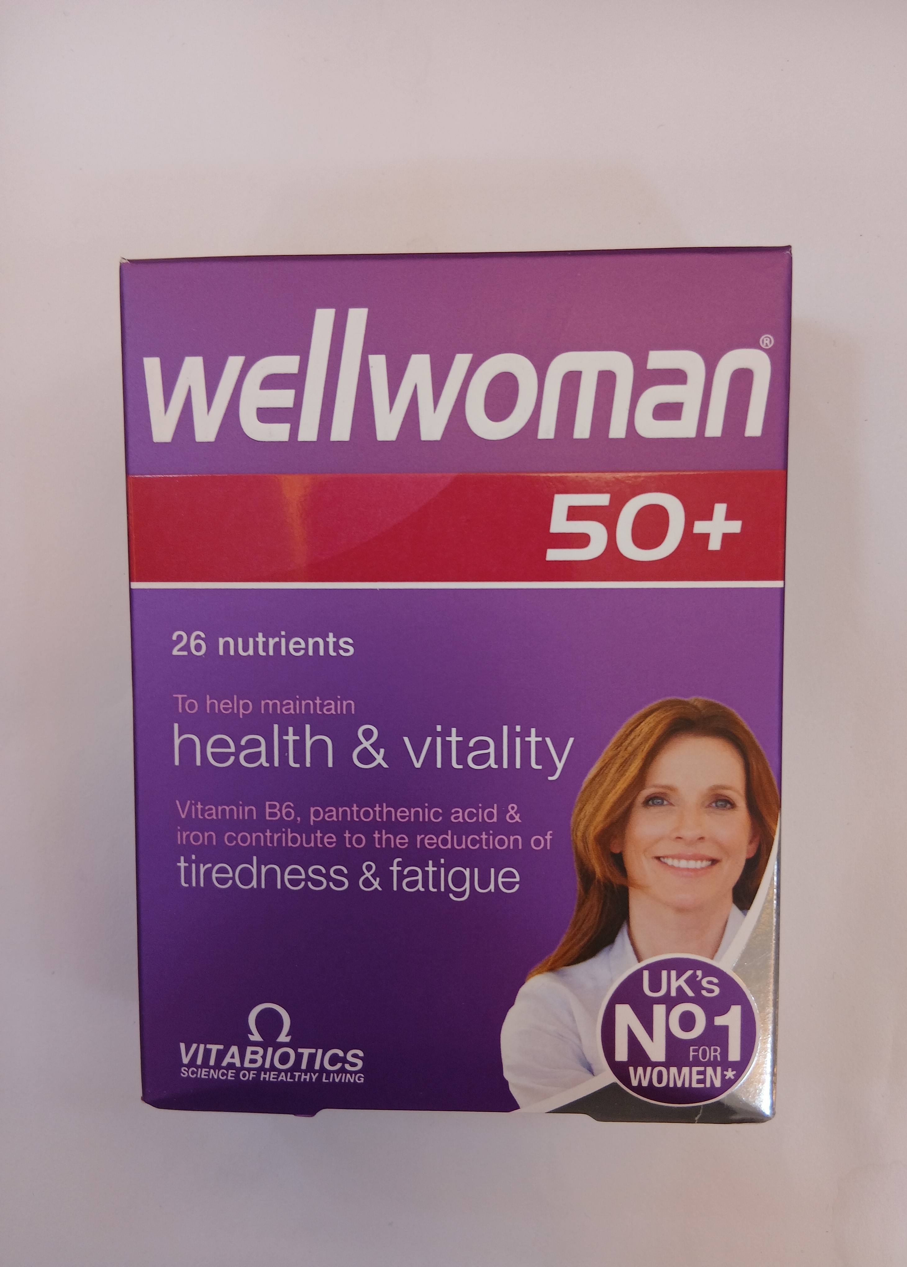 Wellwoman 50+ Women’s Vitamins by Vitabiotics, white cardboard box containing 26-nutrient tablets to support health and vitality, featuring vitamin B6 and pantothenic acid.