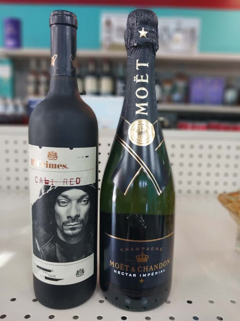 wine and moet on shelf in Luci Lu Liquor