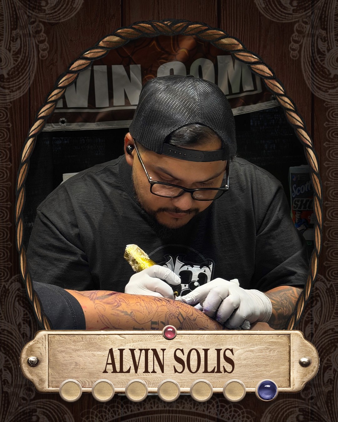 Photo of Alvin Solis working on a piece at a convention. He is know for his black and gray realism tattoos.