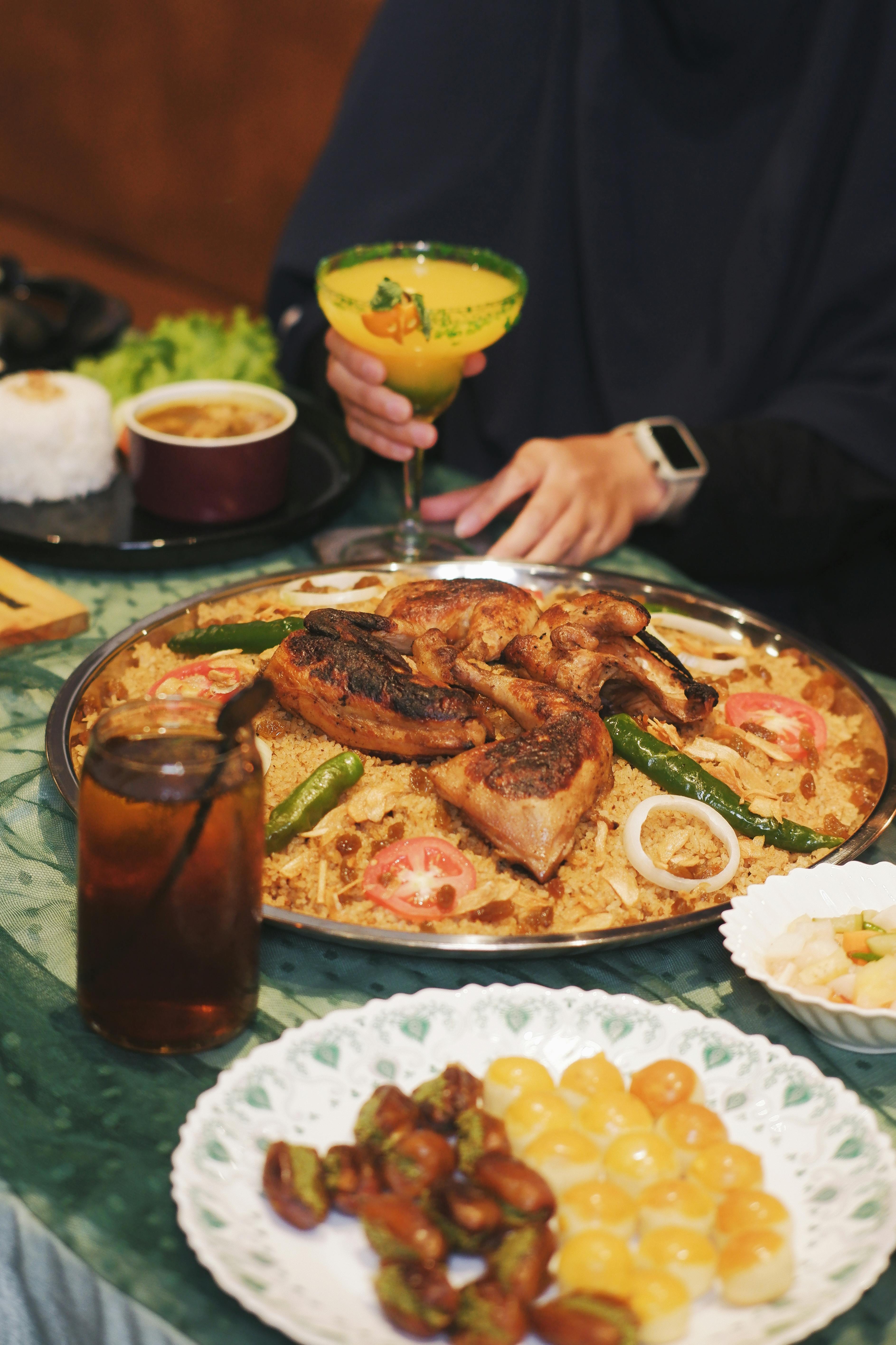 a-vibrant-spread-featuring-indonesian-grilled-chicken,-rice,-and-a-variety-of-si - nurul-sakinah-ridwan (pexels)