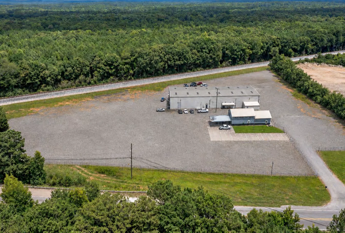 Aerial view of the industrial outdoor storage site at 2611 US Highway 42 S, Locust Grove, GA