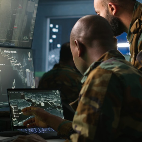 Soldiers using a computer
