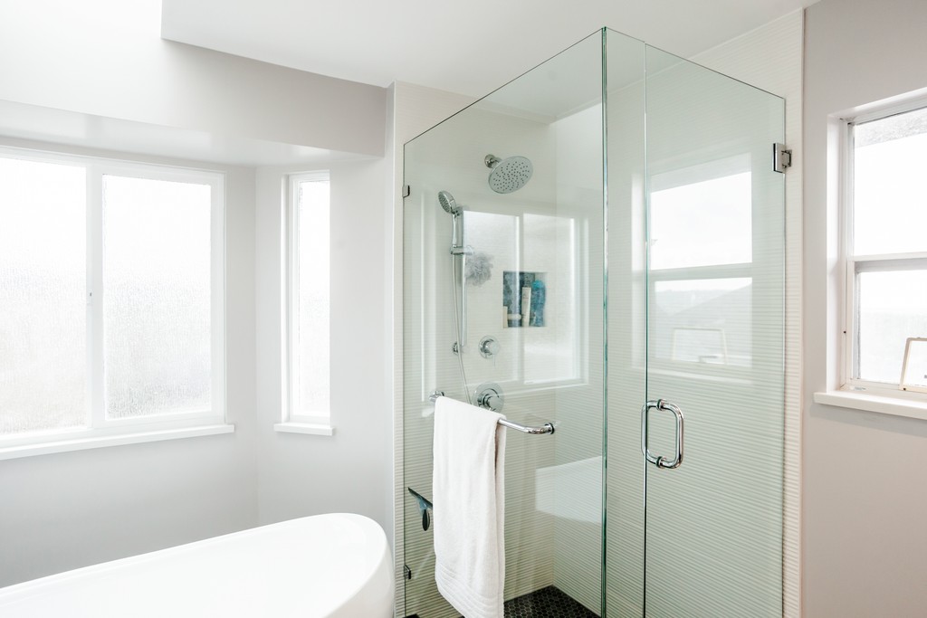 west vancouver ensuite bathroom free standing tub bathtub walk-in shower tiled floor mosaic tile