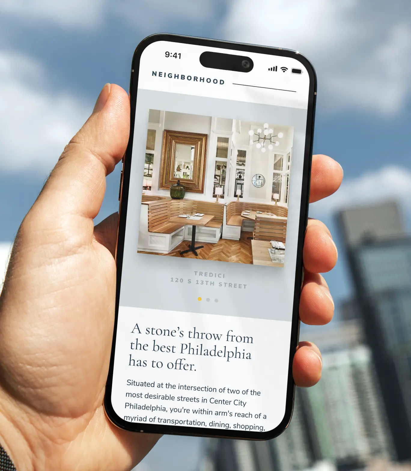 Close-up of 123 S Broad St website on mobile device