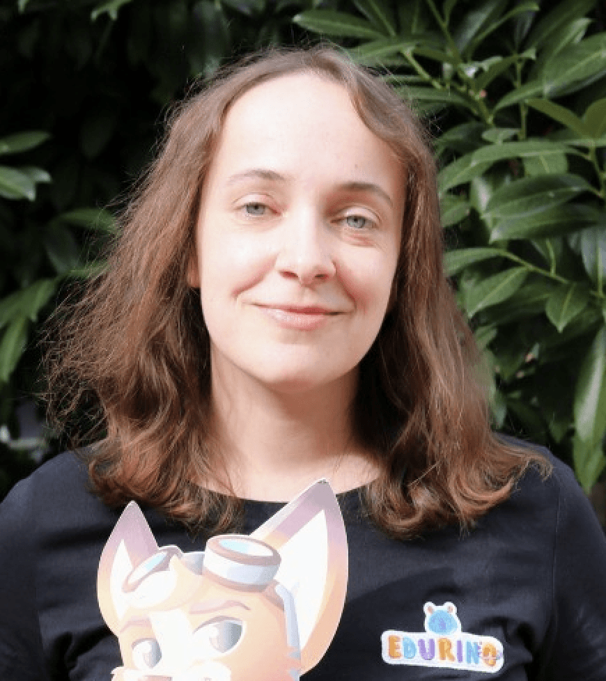 a man in a blue suit posing for a picture