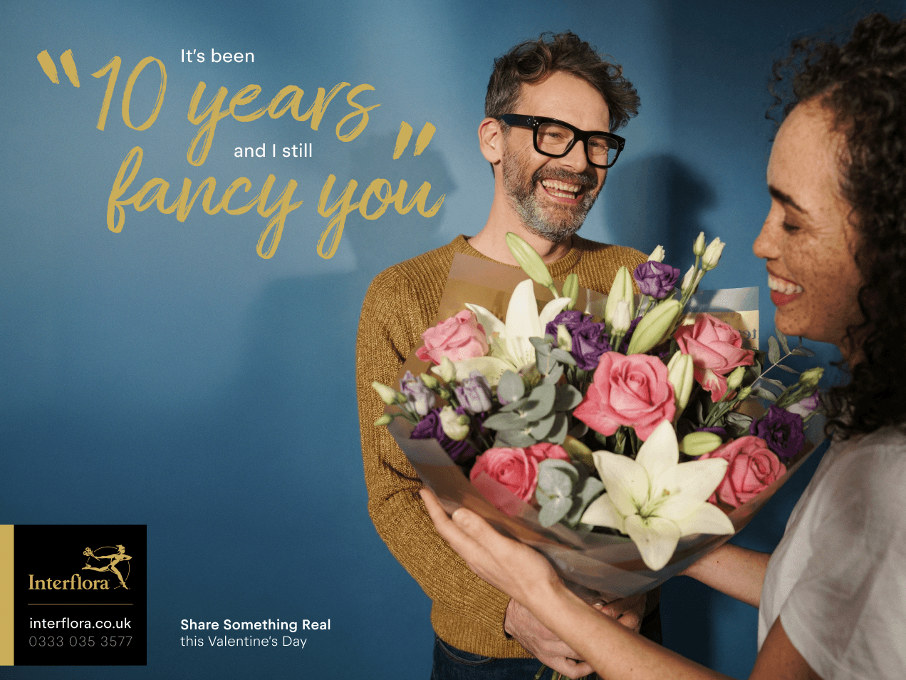 Streetside billboard with flyposters of the Batch.Works brand and illustrations