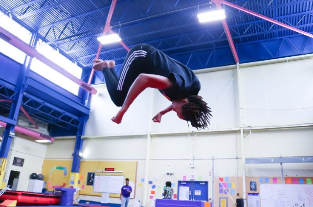 Champion doing back tuck