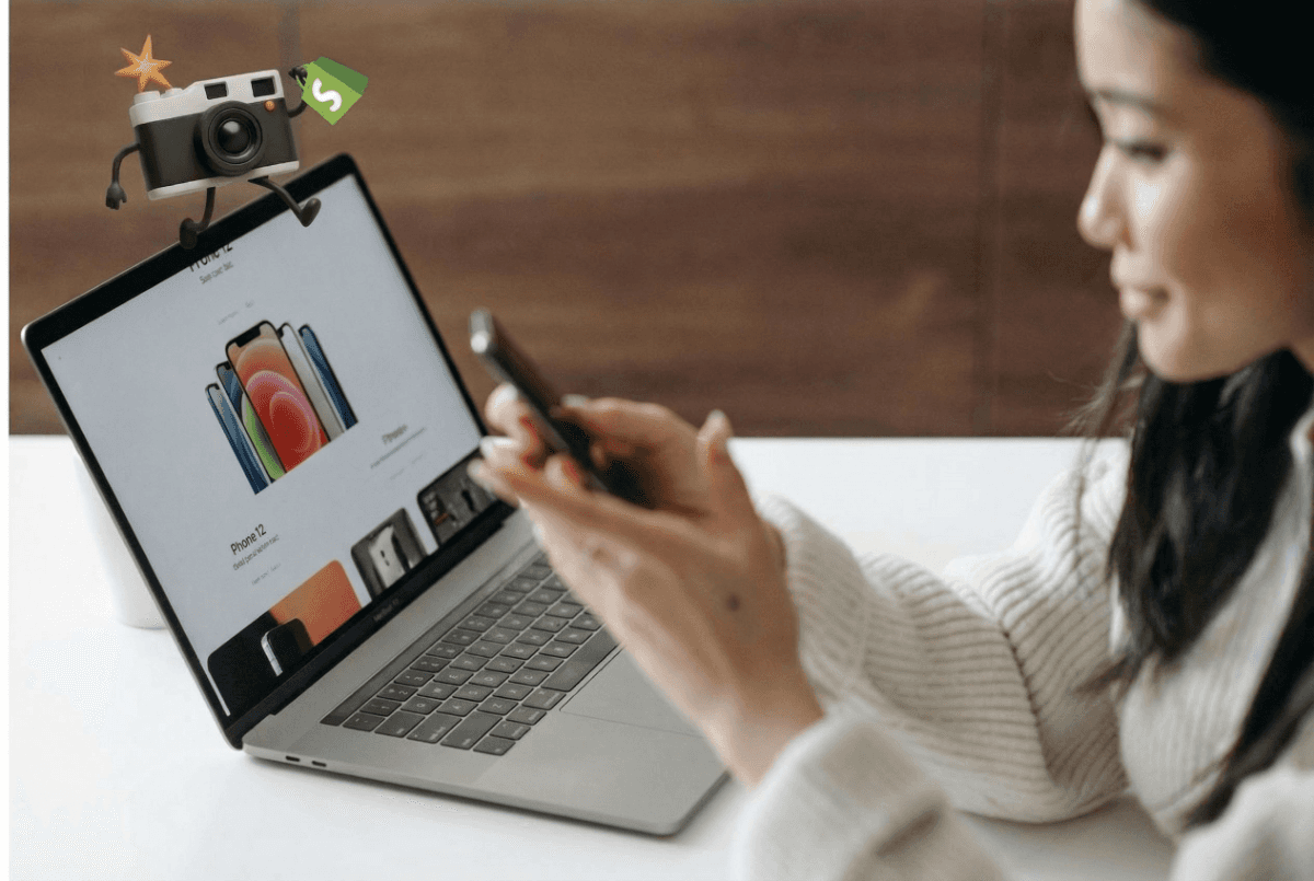 Two babies in skeleton costumes in a wagon with pumpkins.