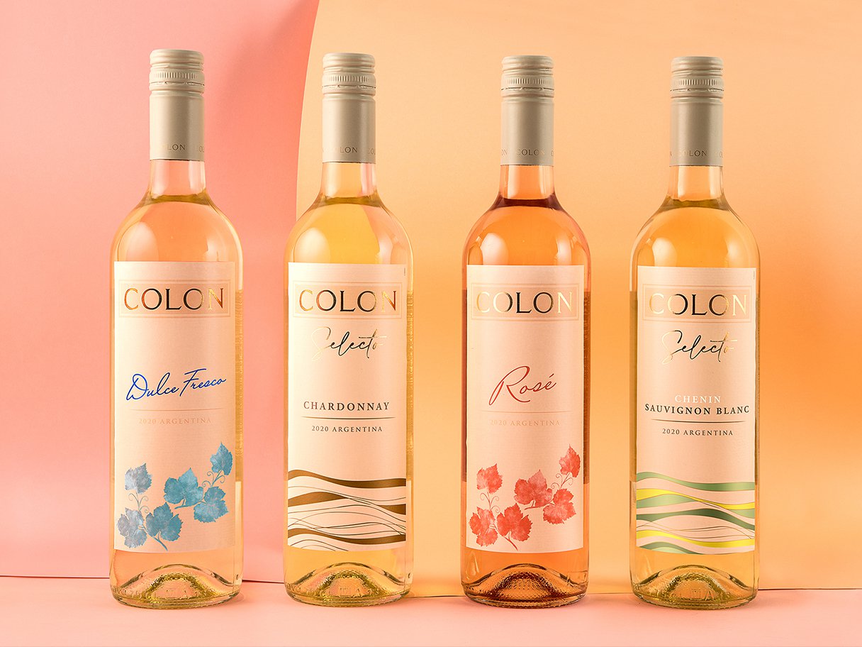 Rooftops of a coastal town with the sea in background