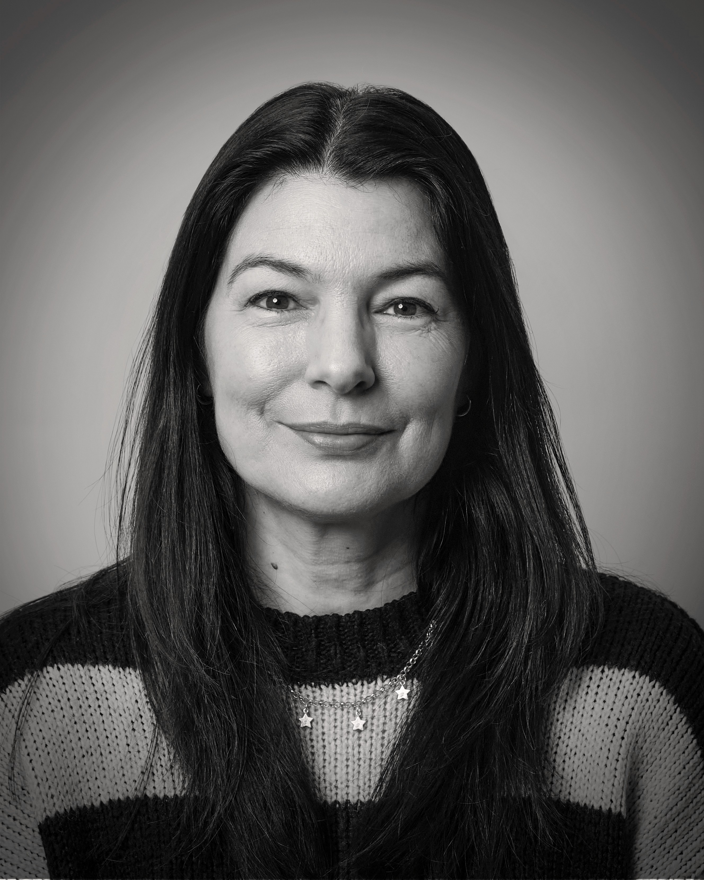 headshot of female in bright background