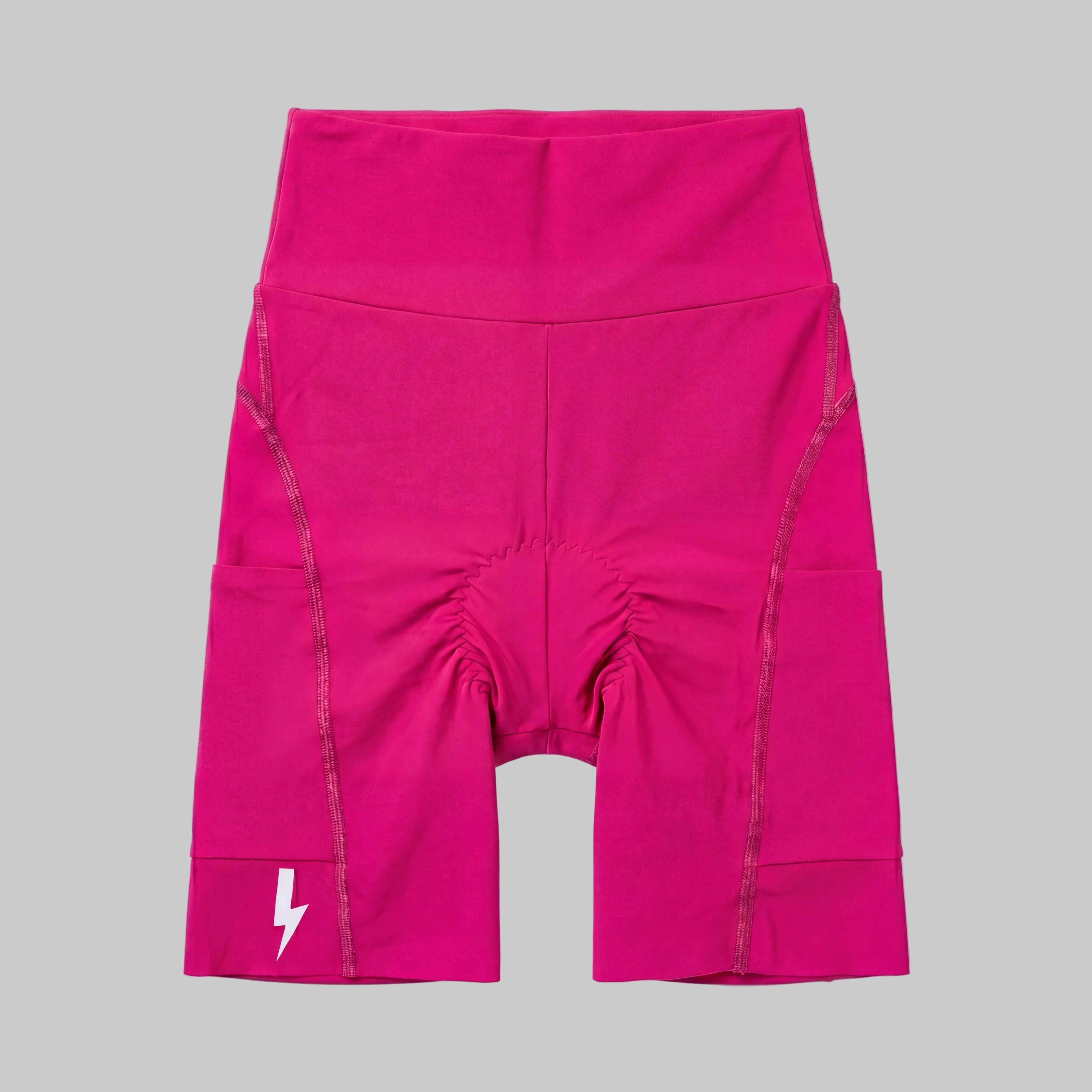 LUCA Empower women's high-waisted cycling shorts in hibiscus, front flat lay with chamois detail