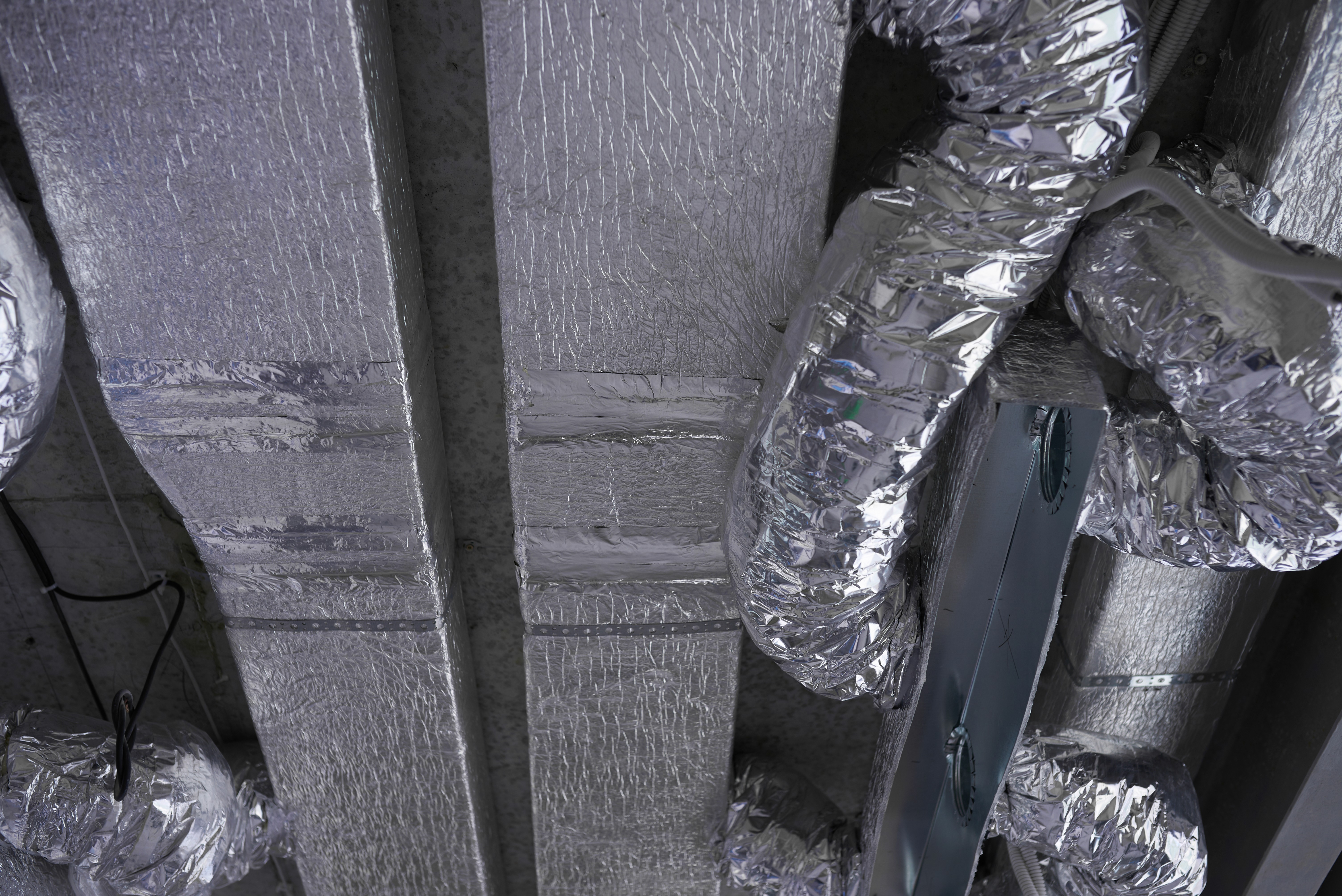 Reflective bubble foil insulation installed on commercial HVAC duct system