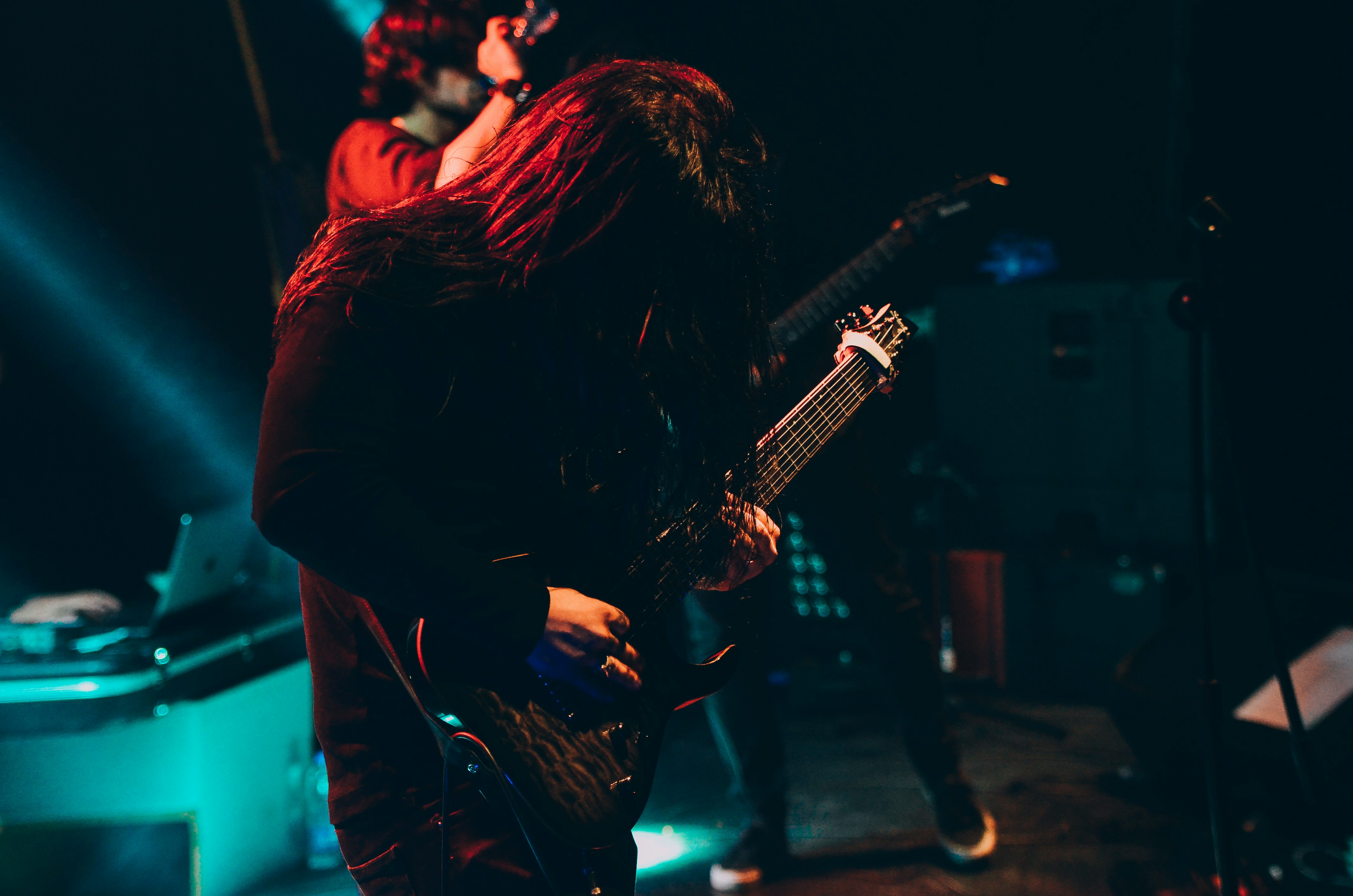 Guitar player on stage performing
