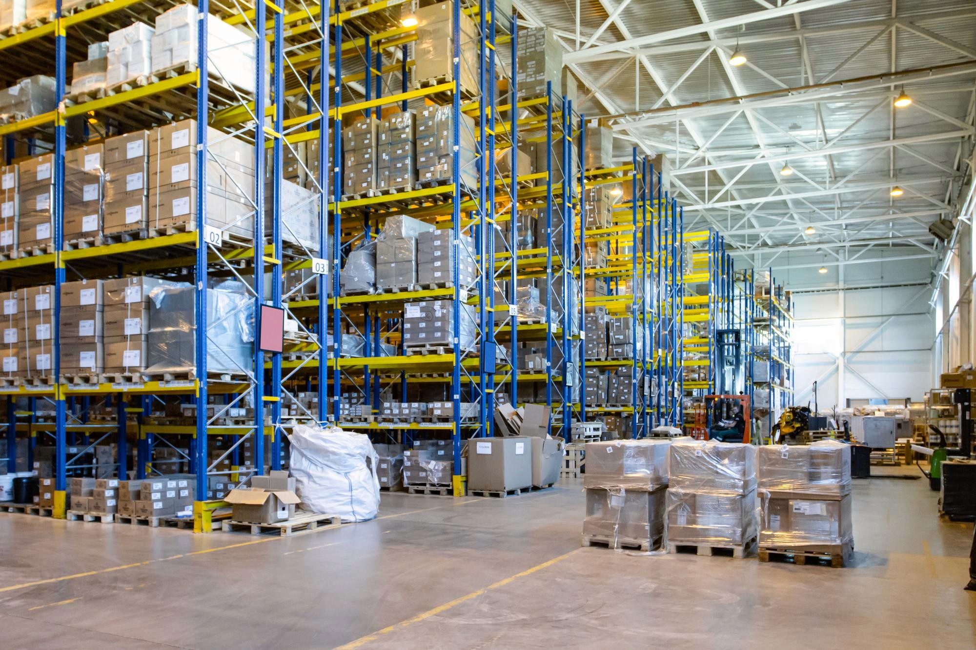 A warehouse full of neatly stacked packages and cargo