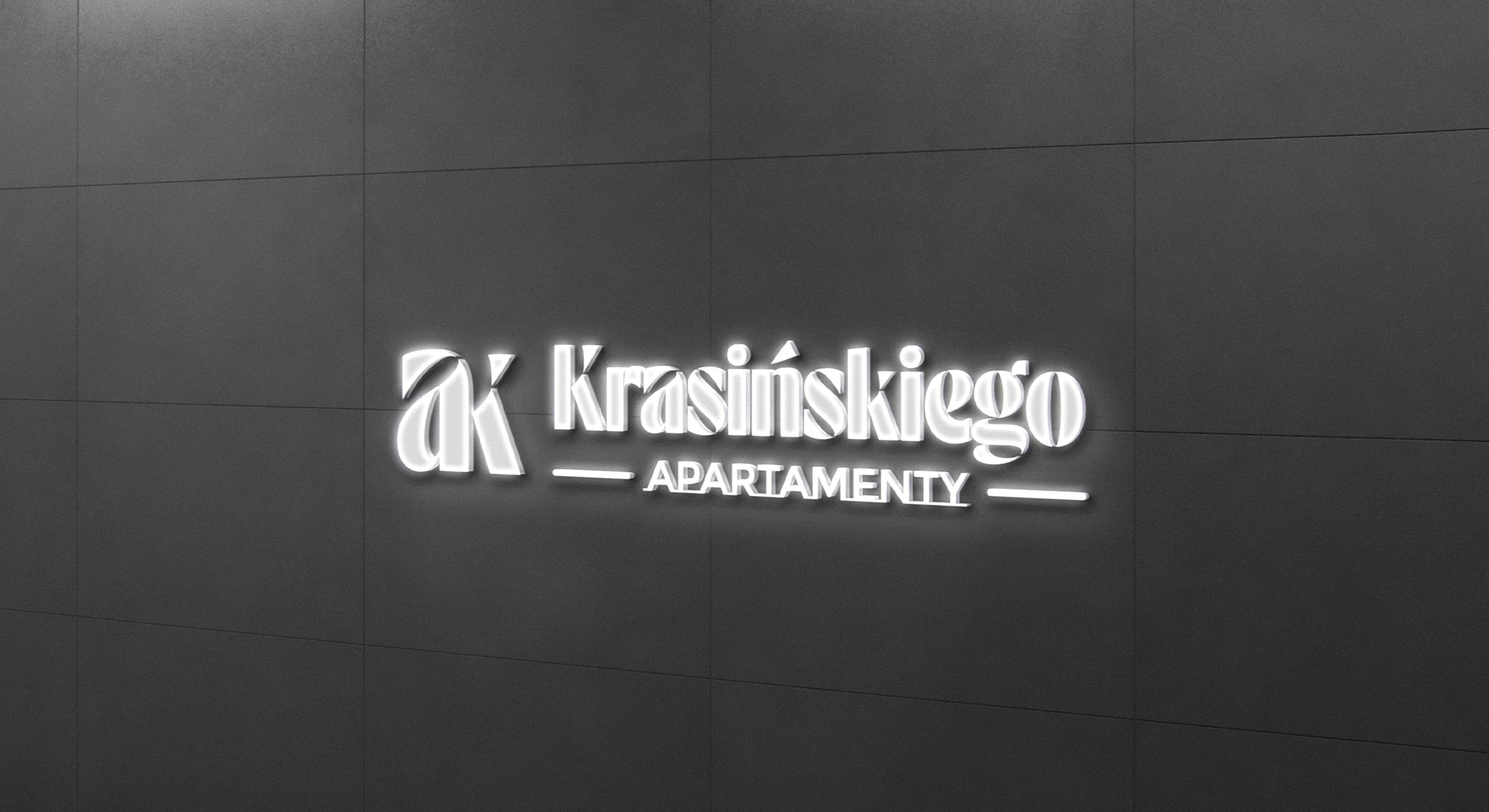 Logo Apartamenty Krasińskiego - aplikacja na ścianie
