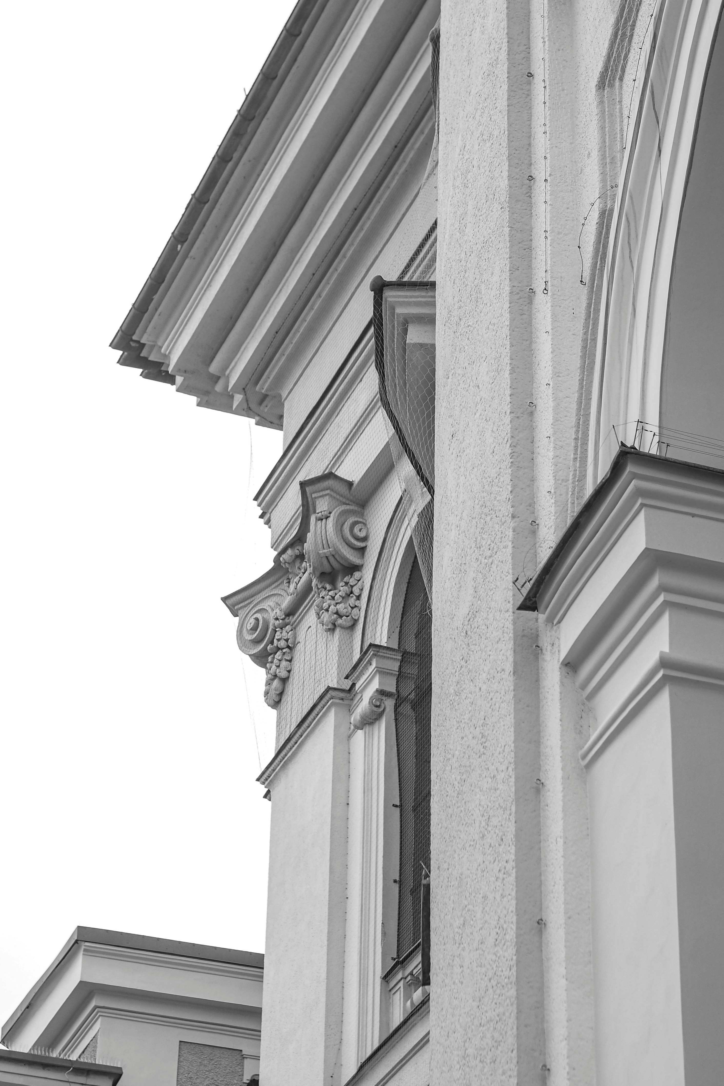 A black and white photo of a clock tower