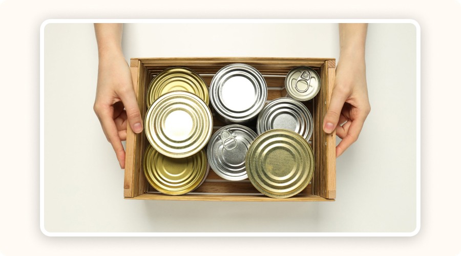 box filled with canned goods
