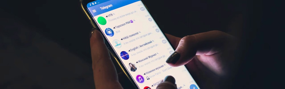 Red digital warning symbol glowing on a circuit board interface, representing active ransomware exploitation of the VMware ESXi CVE 2025 22225 vulnerability and hypervisor compromise.
