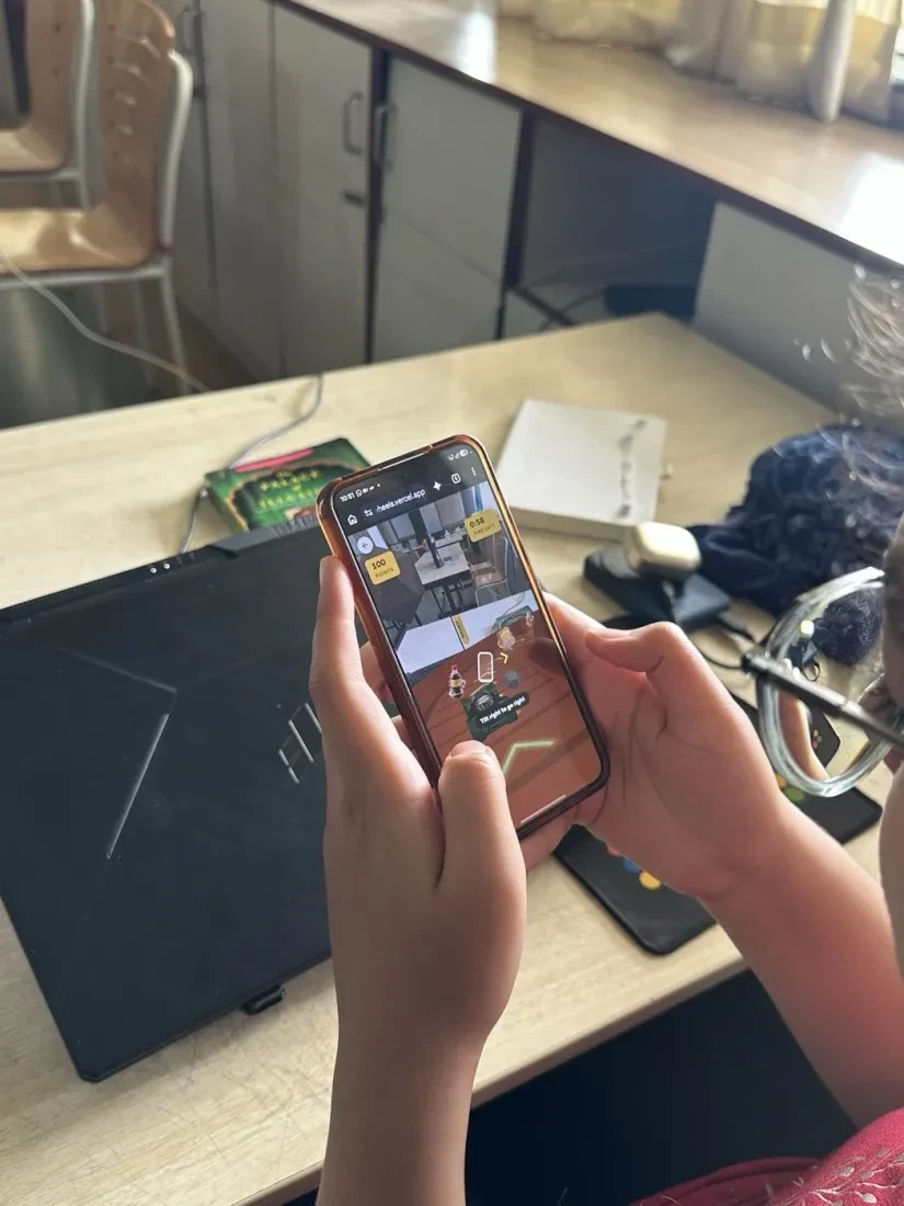 A collector playing the AR race on their phone