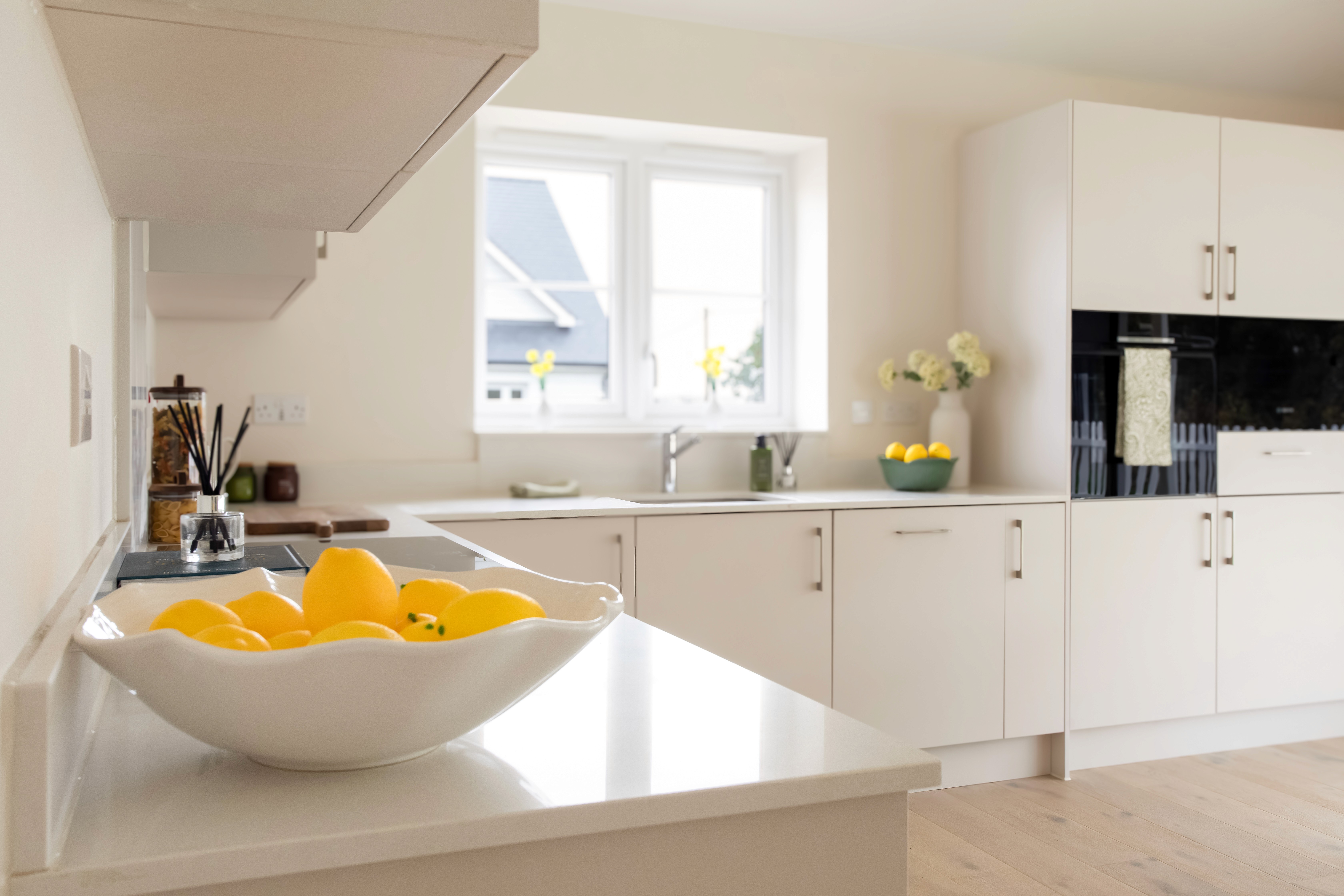 High-quality kitchen details in the Norah home at Salt Meadows, featuring premium appliances, natural light and thoughtful design for later-life living