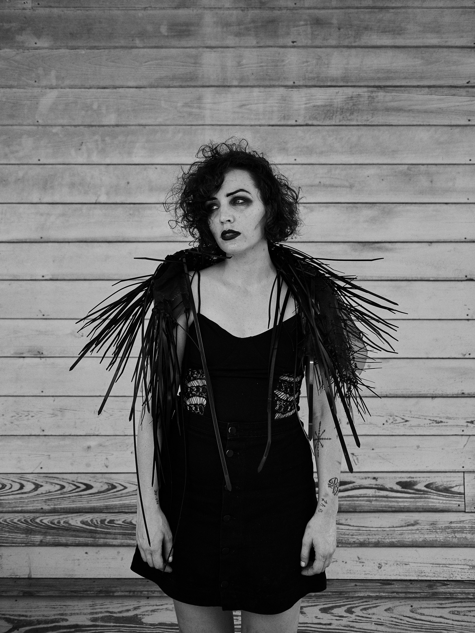 Black and white portraits of young alternative, romantic, goth, freak, punk and metal character against a textured New Orleans backdrop. 