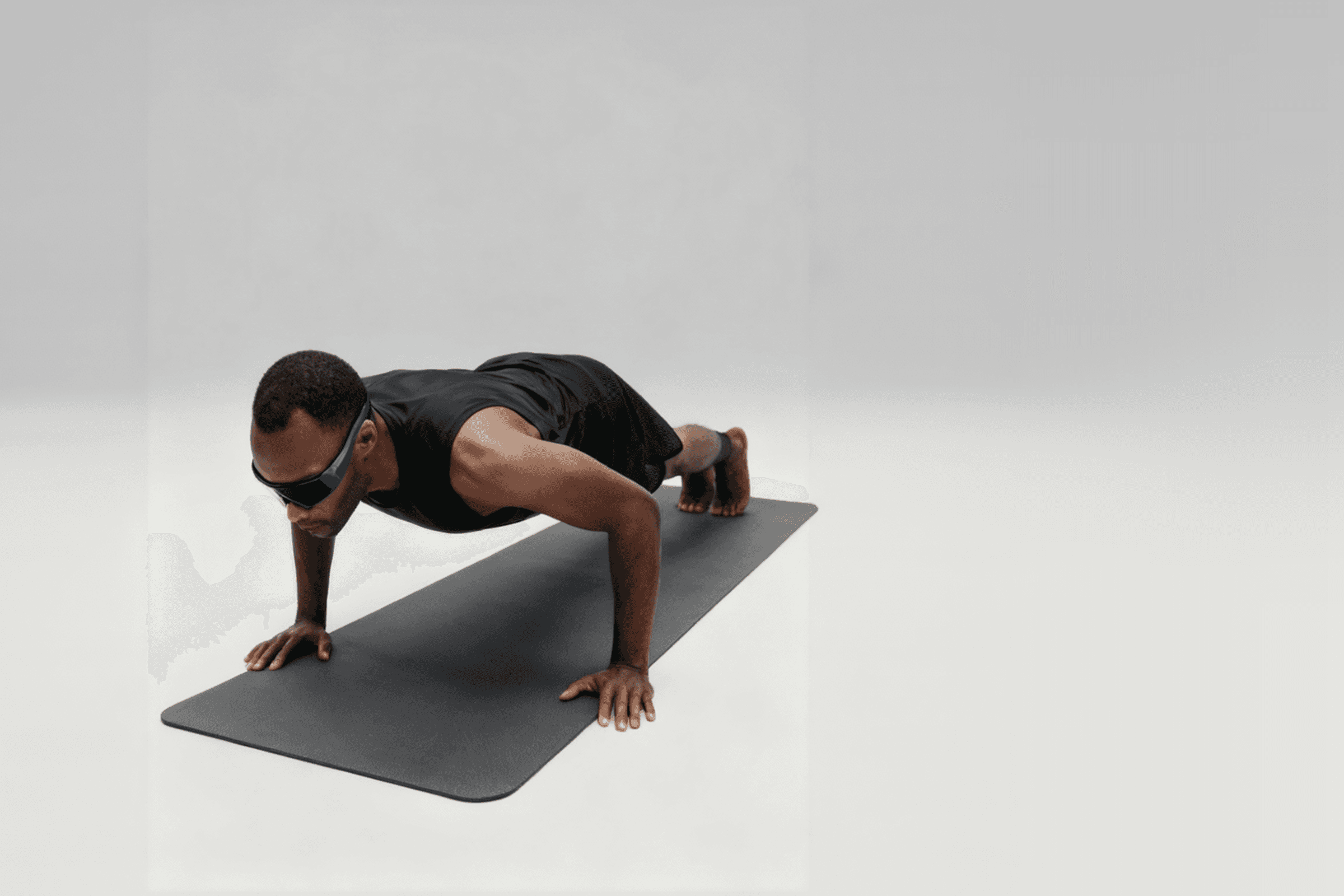 Male athlete training core strength with plank exercise in fitness branding photo