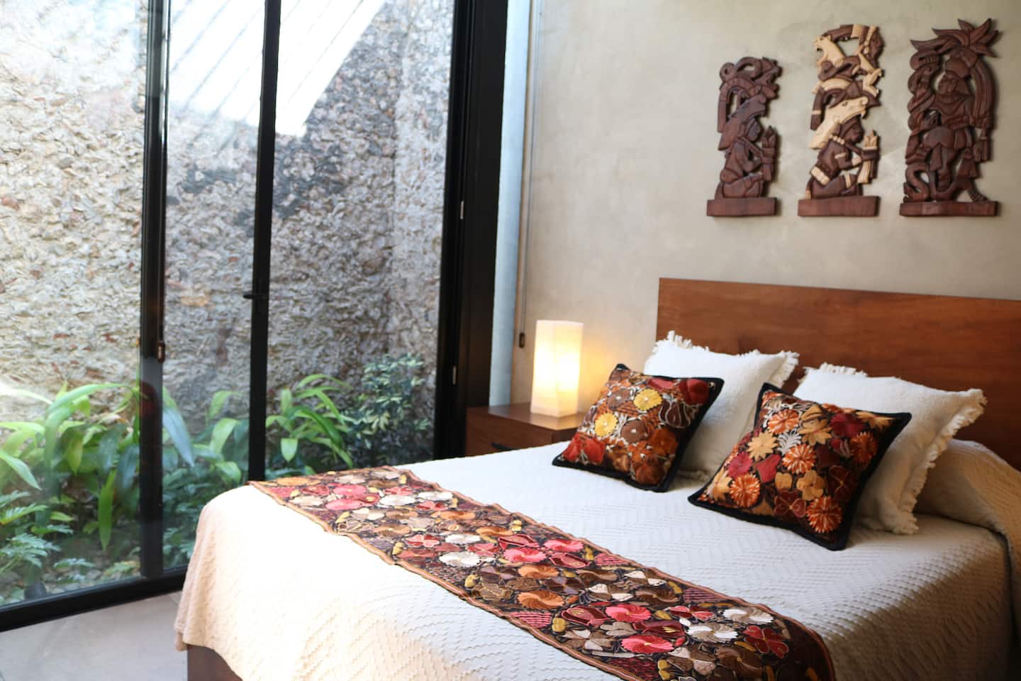 Stone House bedroom with garden-facing windows