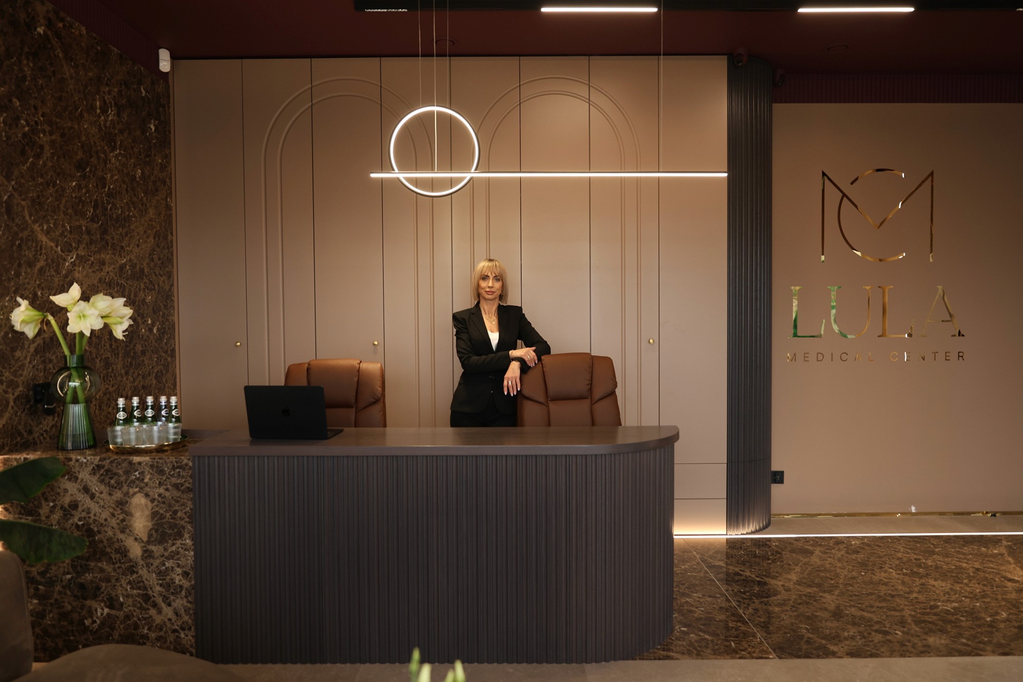 Apple MacBook beside computer mouse on table