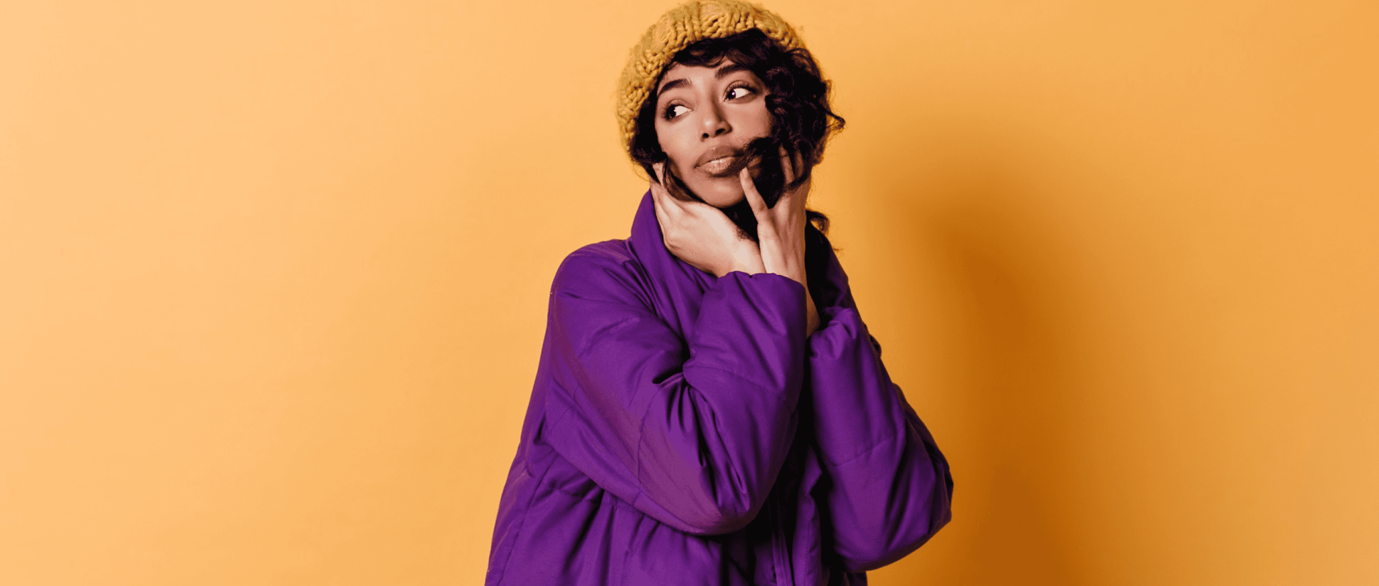 A woman wearing purple clothes