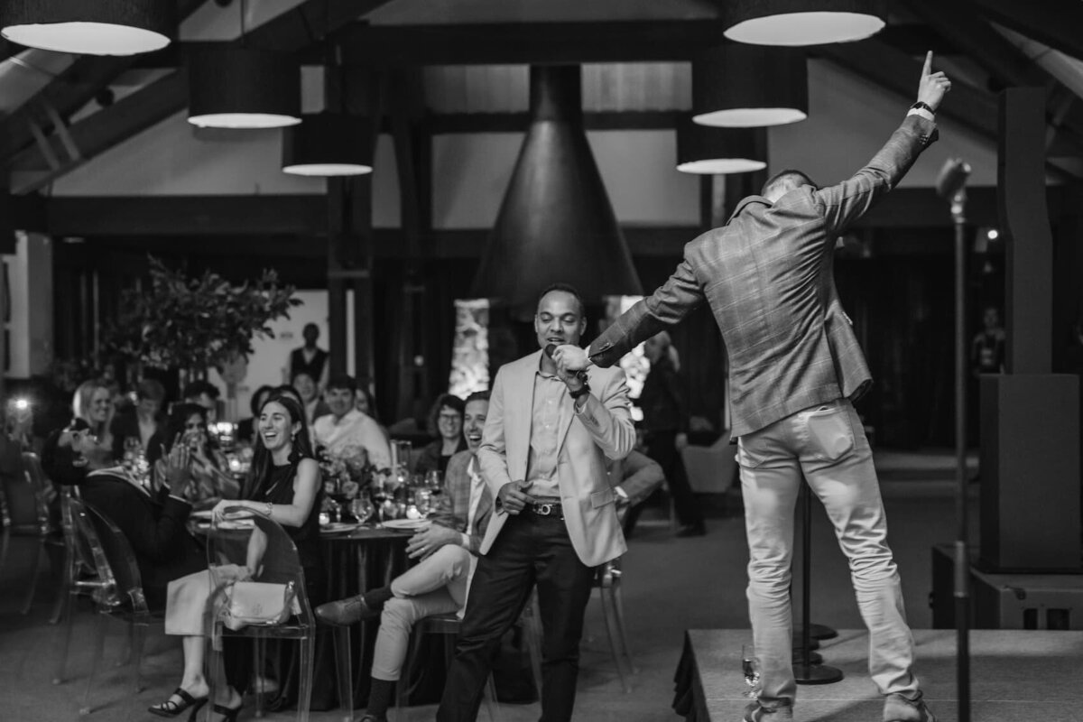Speaker addressing guests at an Aspen event