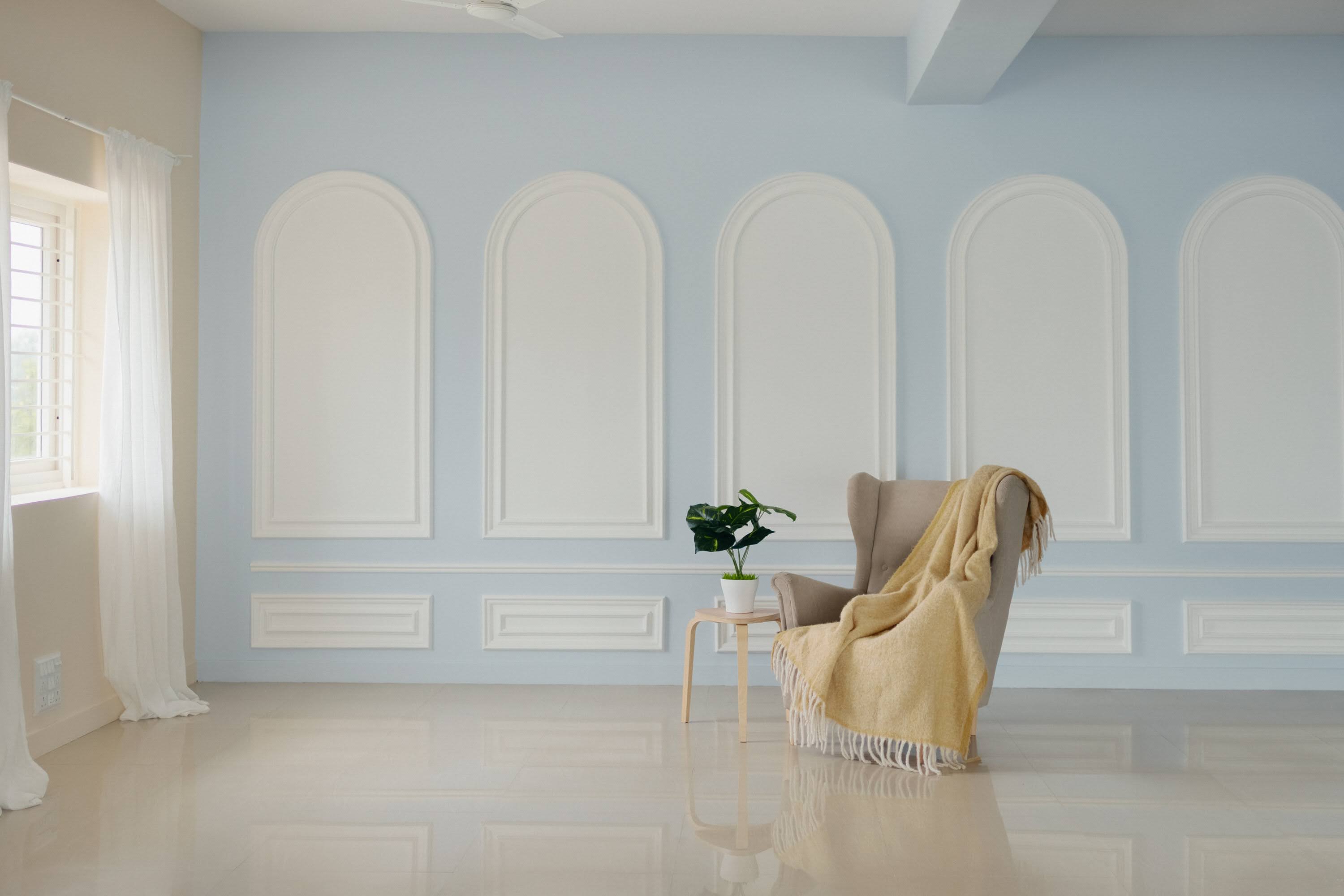 a woman wearing a black coat and a white scarf