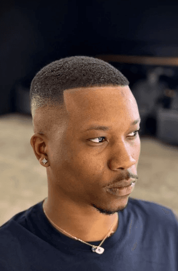 Microfiber hairline enhancement with a clean taper fade, perfect for African American hairstyles by Courtney Palmore. The Rich Barber, West Holllywood, California, Los Angeles