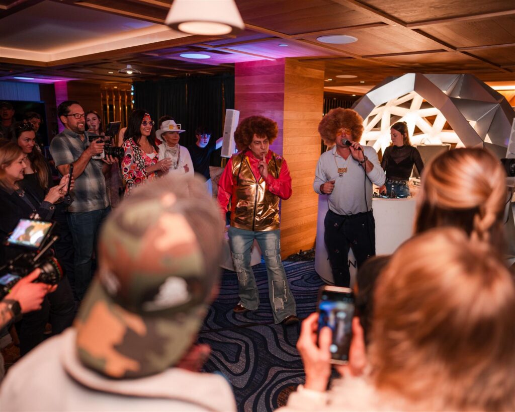 Performer engaging with guests during an indoor event