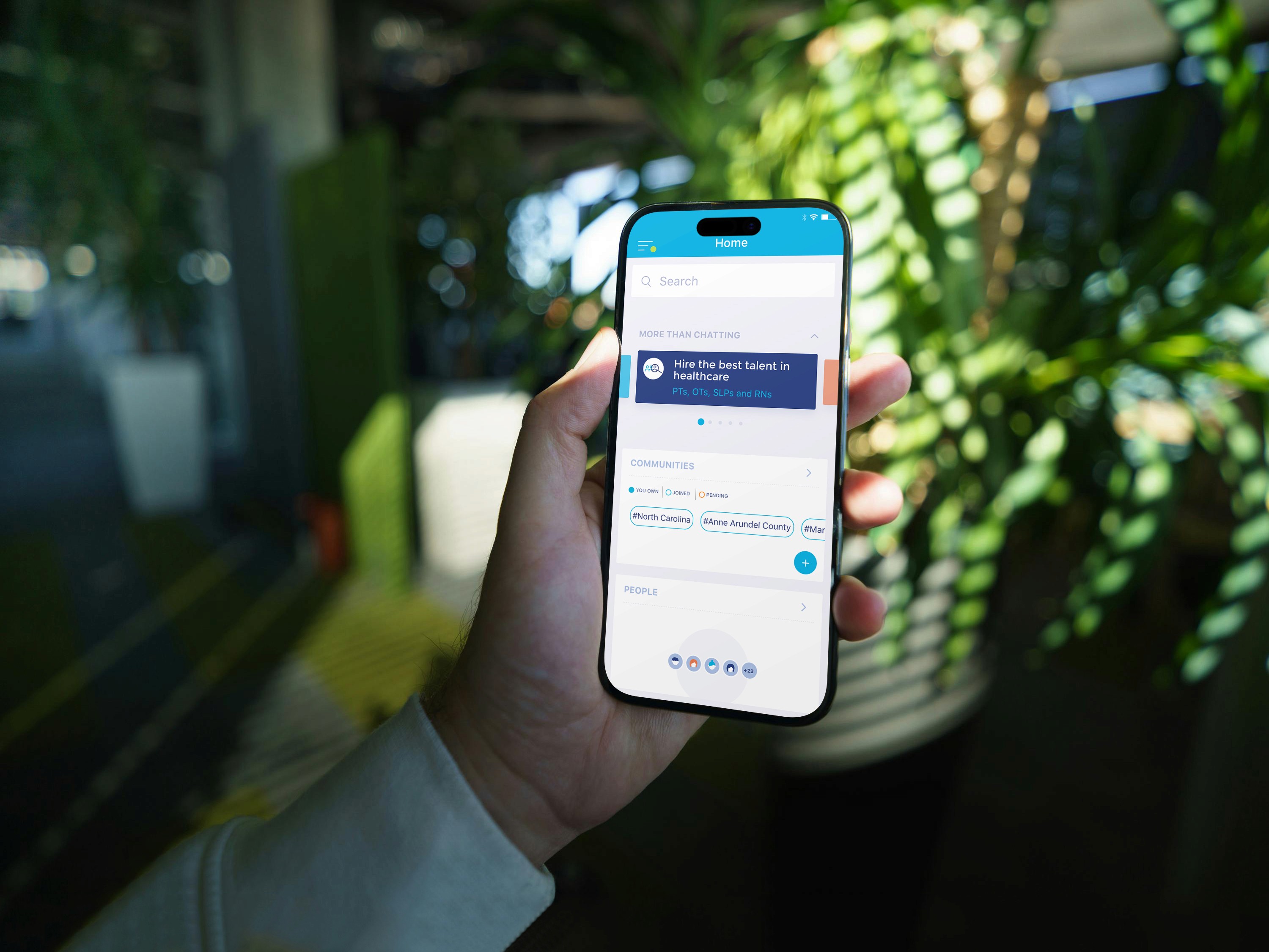 A person using Kure app, while waiting for the doctors visit in Kare Partners clinic
