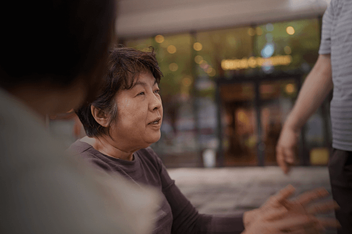 Amateur breakdancer caught in action spinning on head.