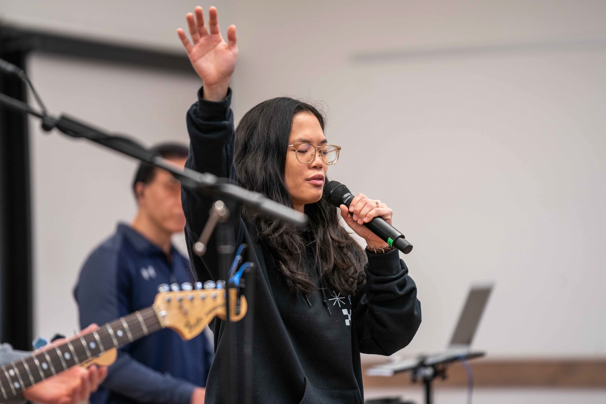 person writing on a piece of paper