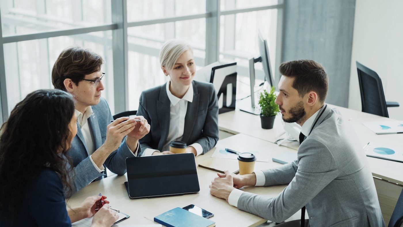 Professional team collaborating in a modern office