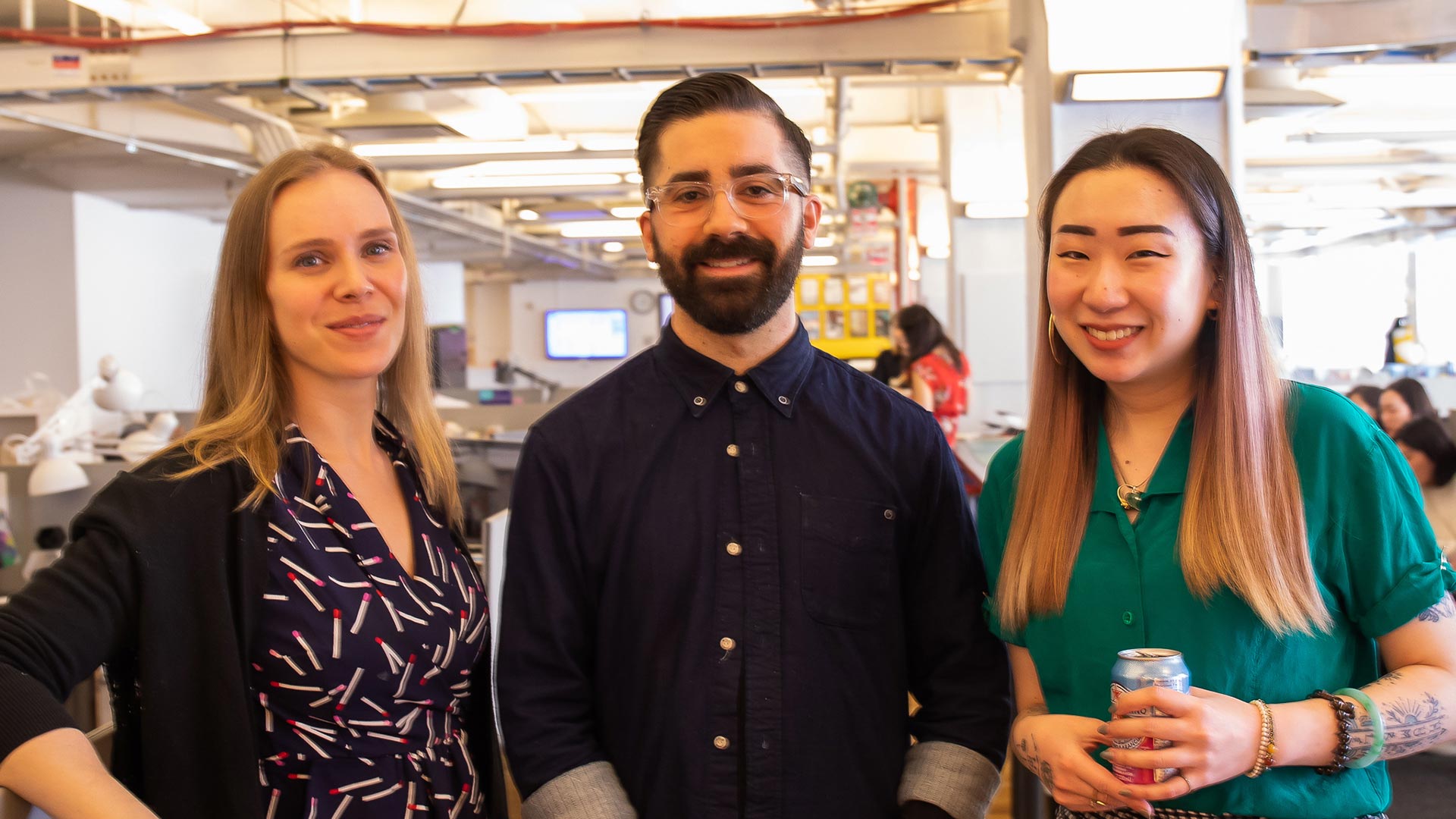 three people smiling