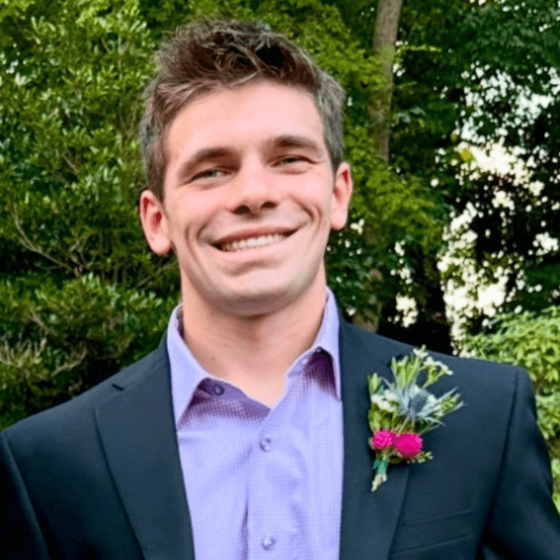 Man smiling in an office