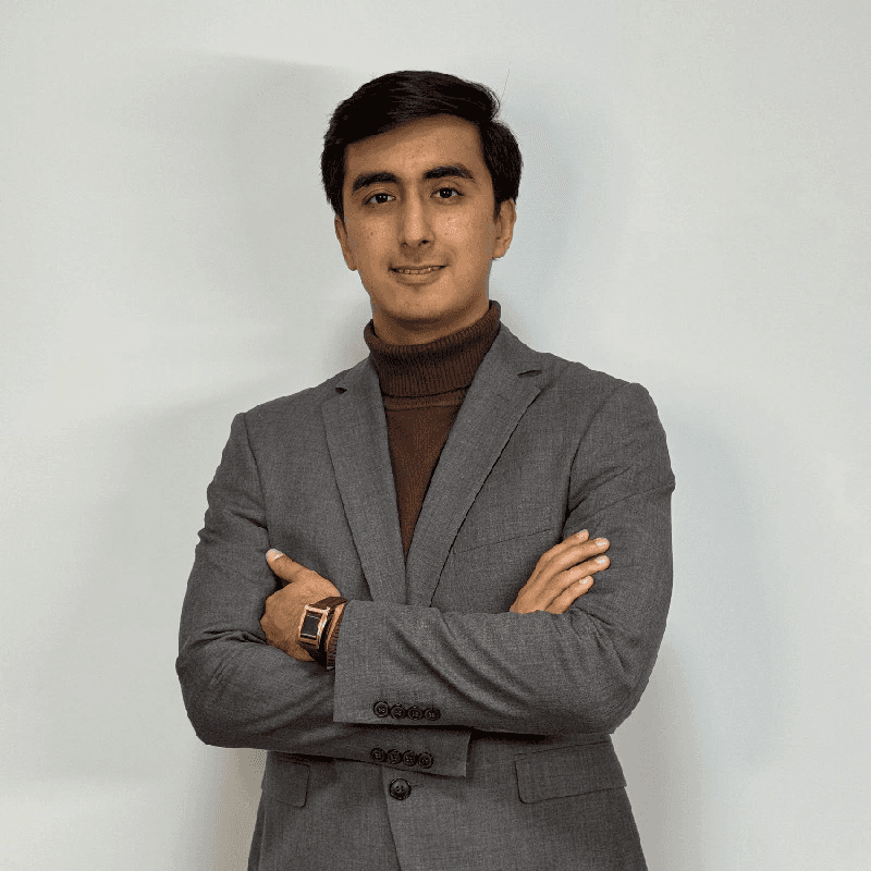woman in black long sleeve shirt sitting on white couch