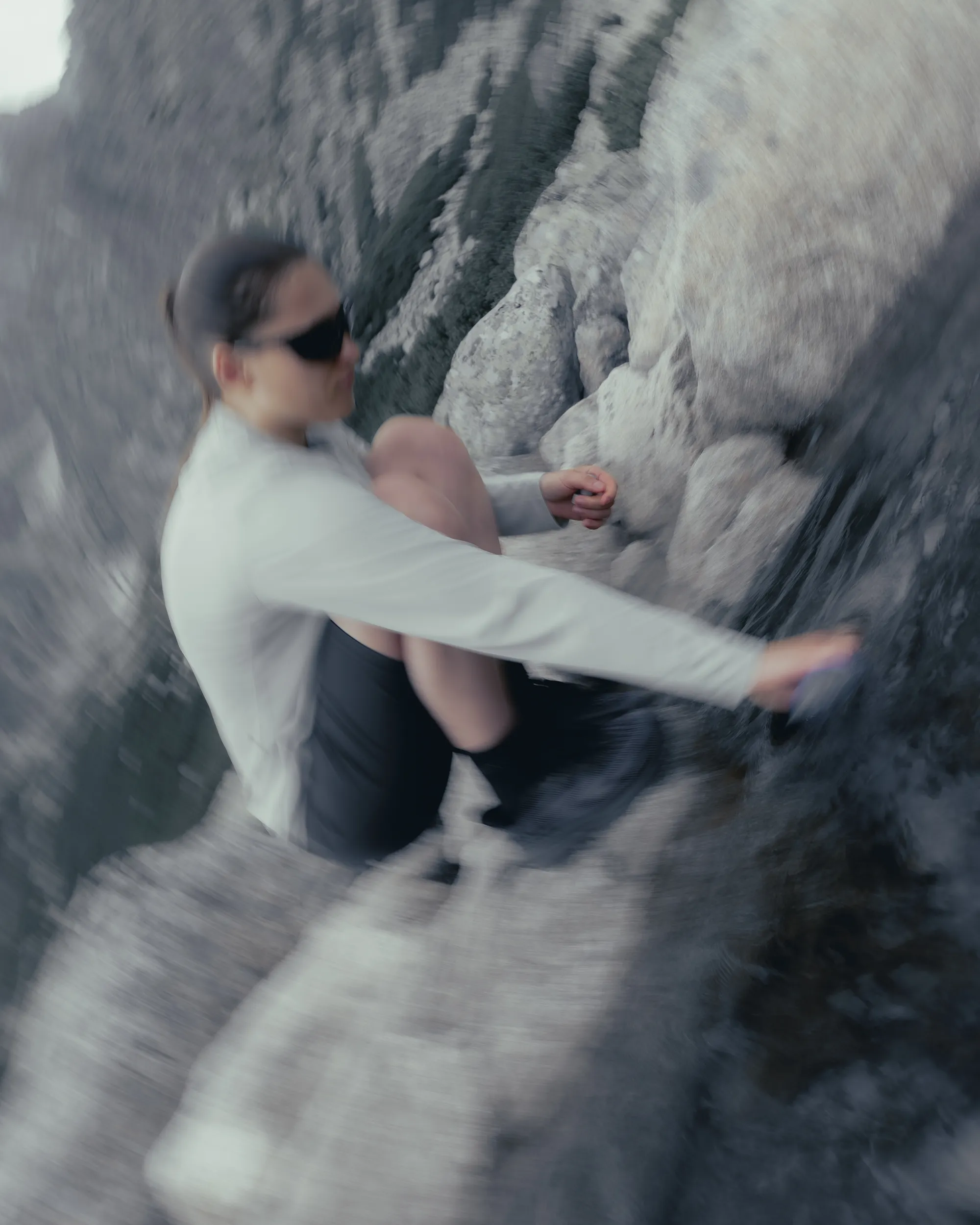 dynamic portrait of a woman in front of the mountain river.