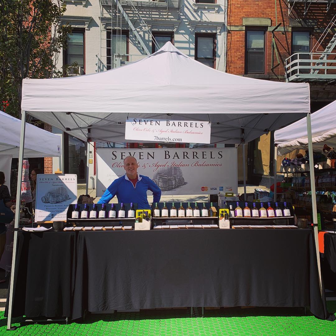 Seven Barrels booth at outdoor festival