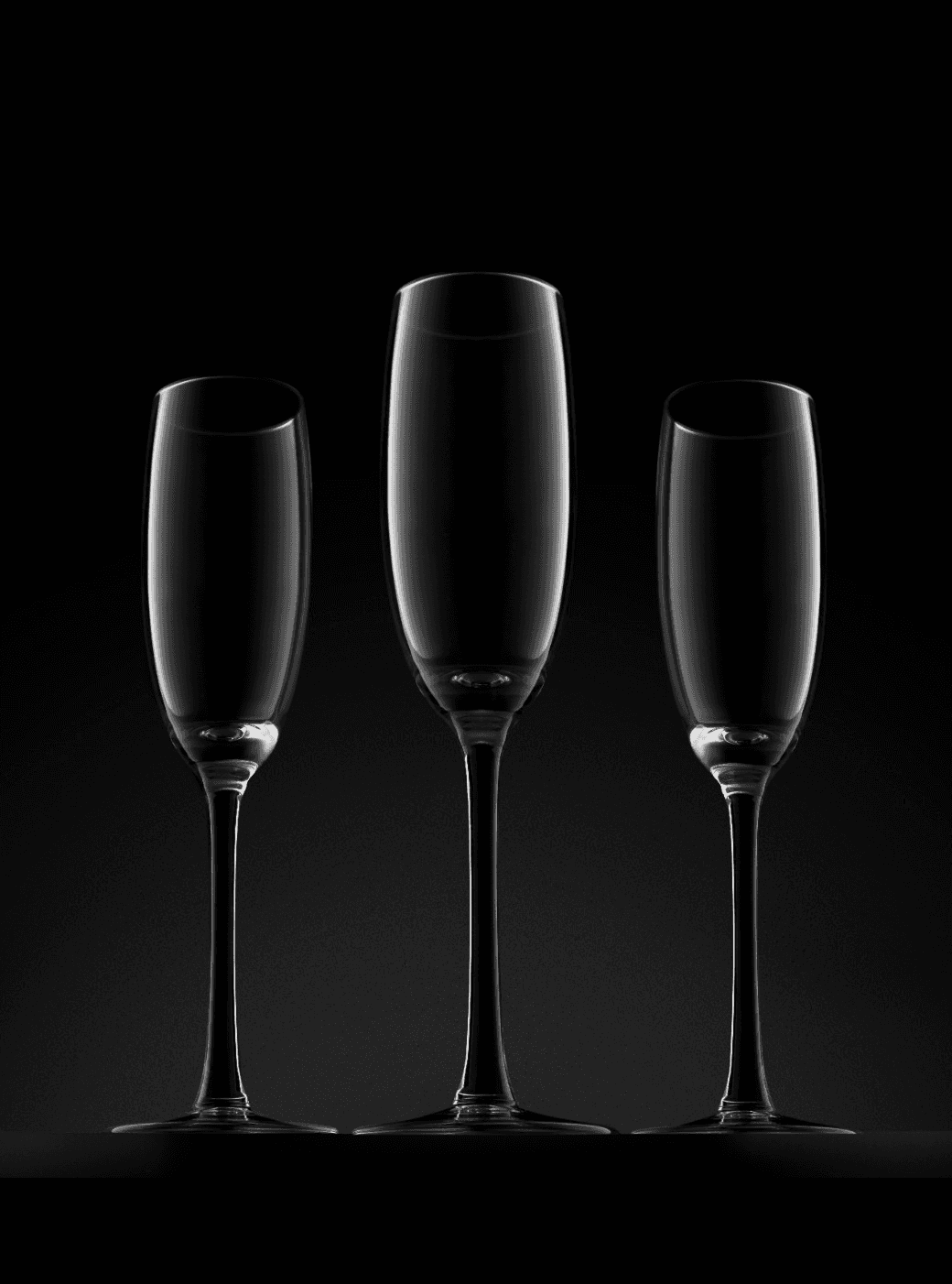 Modern bathroom featuring a walk-in shower, wooden vanity, round mirror, and elegant marble tiles.