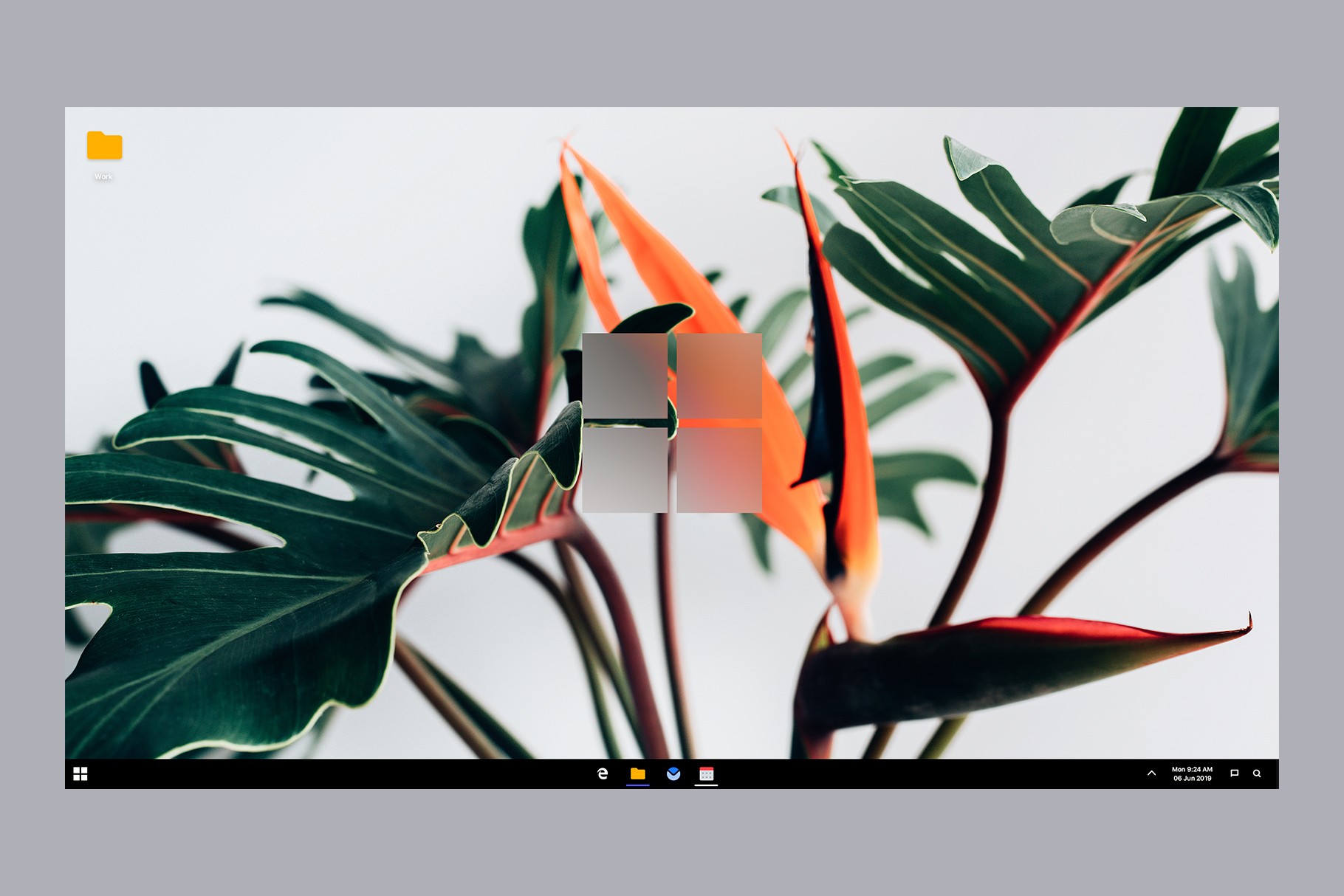 Concept design of Windows 11 with a centered Start menu and a nature-inspired wallpaper.