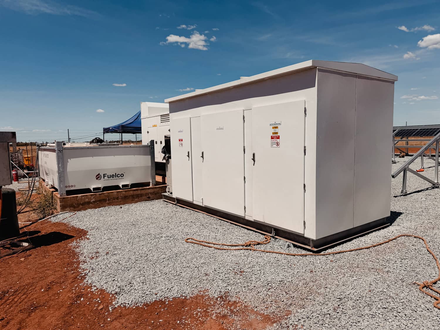 Powerhouse Renewables Group industrial battery storage system with Fuelco container and solar panel array in remote Australia